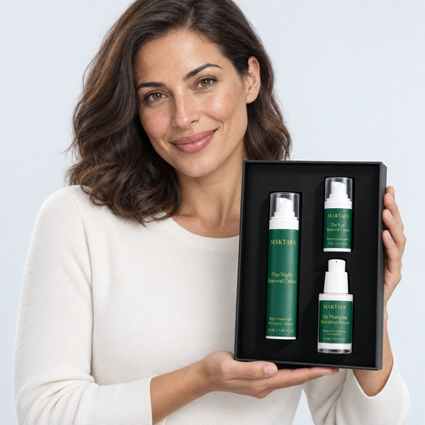 A person presenting the open The Nocturne Ritual box with all three products visible.
