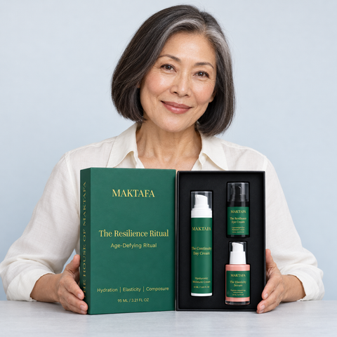 A person presenting the open The Resilience Ritual box with all three products visible.