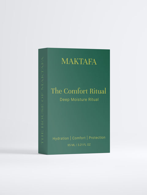 Front of the emerald The Comfort Ritual presentation box with gold lettering.