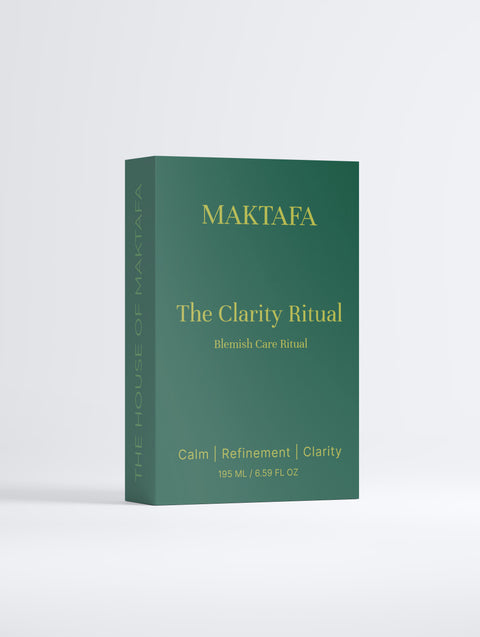 Front of the emerald The Clarity Ritual presentation box with gold lettering.