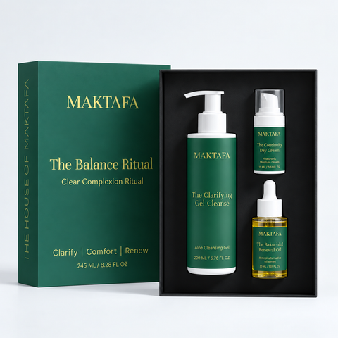 The Balance Ritual: three products fitted inside an open black presentation box, beside its emerald lid.