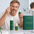 Person applying eye cream beneath an eye, with the Ember Renewal Ritual products on the counter.