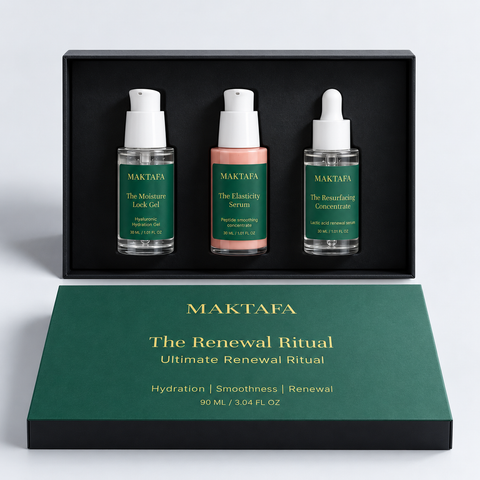 The Renewal Ritual: three products fitted inside an open black presentation box, beside its emerald lid.