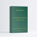 Front of the emerald The Resilience Ritual presentation box with gold lettering.