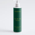 Maktafa The Glow Ritual: Silk Milk Cleanse bottle on a pale grey background.