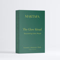 Front of the emerald The Glow Ritual presentation box with gold lettering.