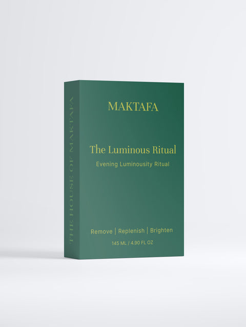 Front of the emerald The Luminous Ritual presentation box with gold lettering.